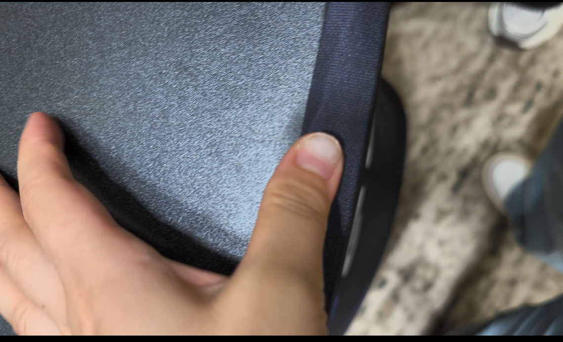 Printed fabric edge secured around the portable display counter