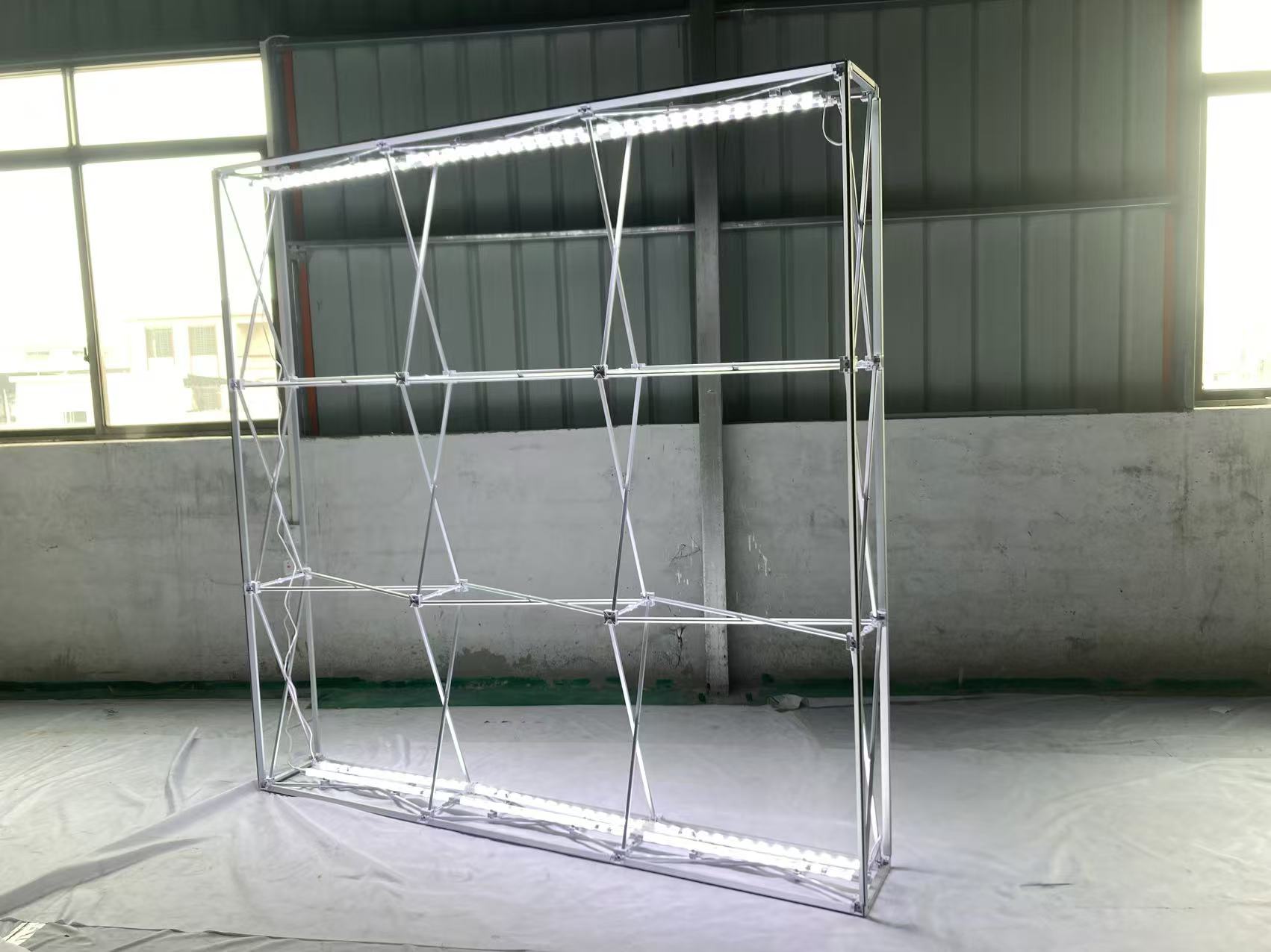 Expandable aluminum pop-up lightbox during factory lighting test